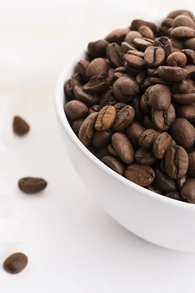 Bowl of caffee beans on a white background — Stock Photo, Image