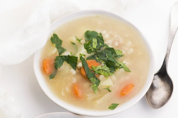 Barley soup, pearl barley in white bowl — Stock Photo, Image