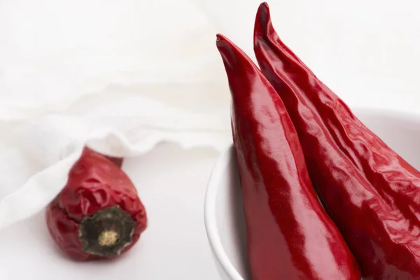 Bowl of red hot chili pepper on white background — Stock Photo, Image