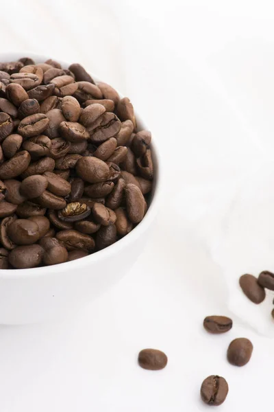 Bowl of caffee beans on a white background — Stock Photo, Image