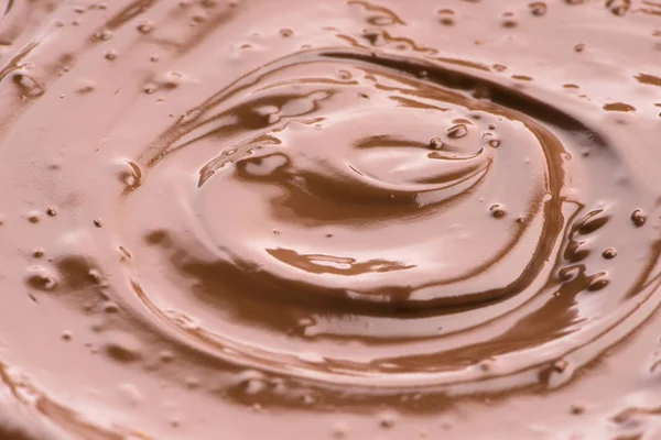 Roztopione tło czekoladowe. Zbliżenie obrazu — Zdjęcie stockowe