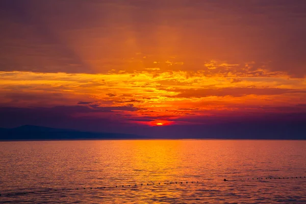 Zonsondergang met stralen — Stockfoto