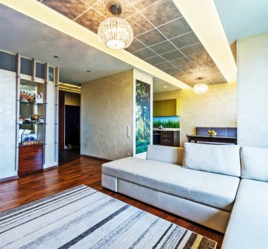 Kanepe ve ahşap zemini olan lüks bir oturma odası. 3d oluşturma 