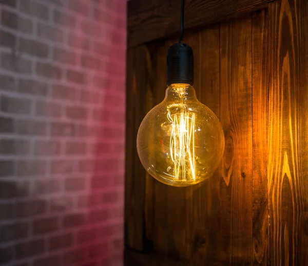 Light Bulb Wooden Background — Stock Photo, Image