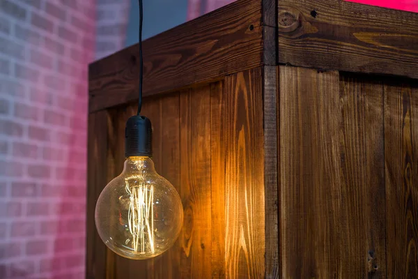 Light Bulb Wooden Background — Stock Photo, Image