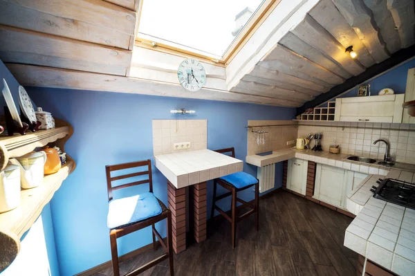 Casual kitchen in the attic — Stock Photo, Image
