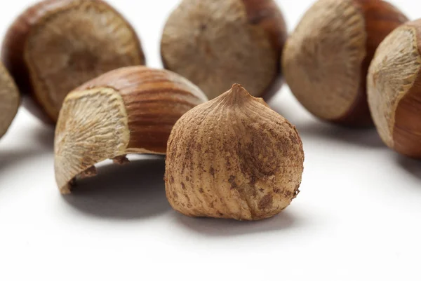 Cracked Hazelnut, isolated on white background, brown hazelnuts — Stock Photo, Image