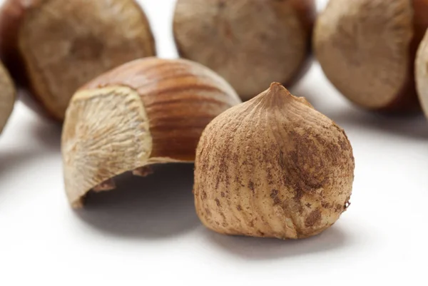 Cracked Hazelnut, isolated on white background, brown hazelnuts — Stock Photo, Image