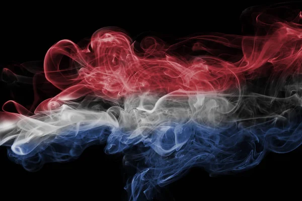 Hollanda bayrağı duman — Stok fotoğraf
