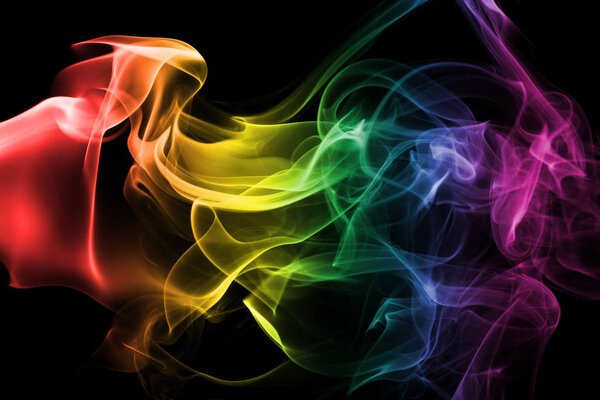 Colorful rainbow smoke isolated on a black background