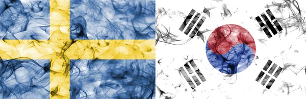 Sverige vs Sydkorea rök flagga — Stockfoto