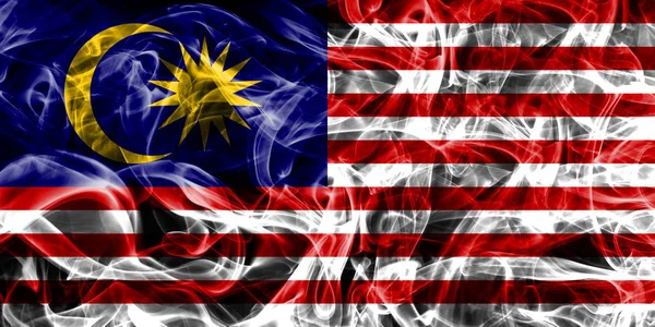 Malesia fumo bandiera su uno sfondo nero — Foto Stock