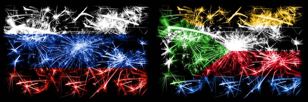 Russia, Russian vs Comoros, Comorian New Year celebration sparkling fireworks flags concept background. Combination of two states flags — Stock Photo, Image