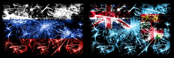 Росія, російське святкування Нового року проти Фіджі, що відзначає ігристі феєрверки, відзначає концепт-фон. Комбінація прапорів двох держав. — стокове фото