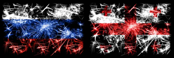 러시아, 러시아 대조지아, 조지아 새해 축하 불꽃 깃발 컨셉트 배경. 두 개의 주 (州) 깃발의 조합 — 스톡 사진