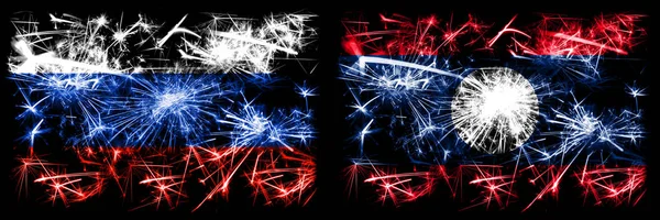 Russia, Russian vs Laos New Year celebration sparkling fireworks flags concept background. Combination of two states flags — Stock Photo, Image