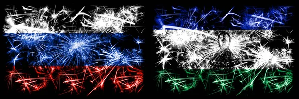 Rusland, Russisch vs Lesotho Nieuwjaar viering sprankelend vuurwerk vlaggen concept achtergrond. Combinatie van twee vlaggen van staten — Stockfoto