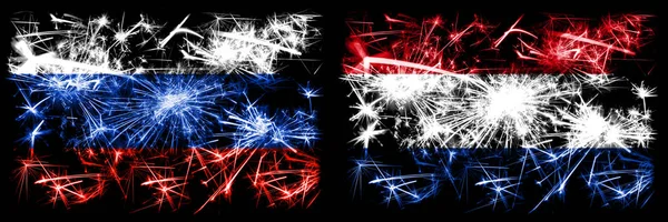 Росія, Росія проти Нідерландів, голландське святкування Нового року, яке блищить феєрверки, відзначає концепт фон. Комбінація прапорів двох держав. — стокове фото