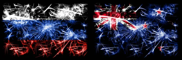 Rússia, Rússia vs Nova Zelândia, Nova Zelândia Celebração do Ano Novo Fogos de artifício cintilantes fundo conceito bandeiras. Combinação de dois pavilhões dos Estados — Fotografia de Stock
