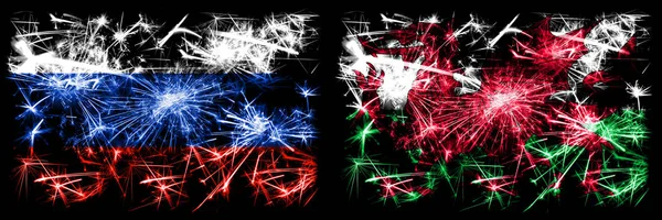 Russia, Russian vs Wales, Welsh New Year celebration sparkling fireworks flags concept background. Combination of two states flags — Stock Photo, Image