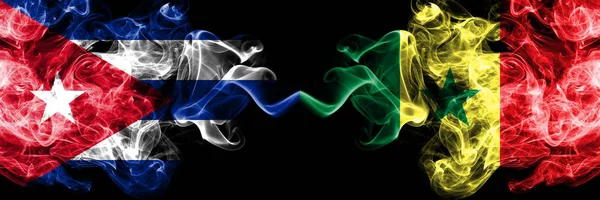 Cuba, Cuban vs Senegal, Senegalese smoky mystic flags placed side by side. Thick colored silky travel abstract smokes banners. — Stock Photo, Image