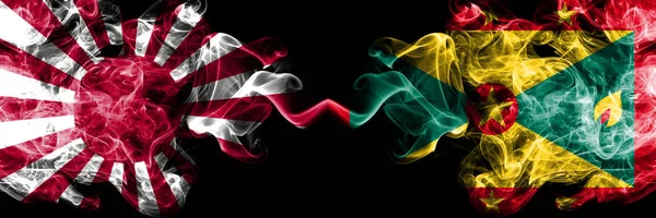 Japan rising sun naval vs Grenada smoky mystic flags placed side by side. Thick colored silky travel abstract smokes banners — Stock Photo, Image