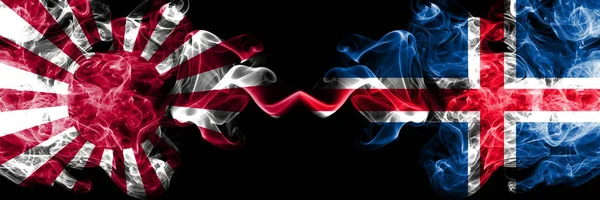 Japón sol naciente naval vs Islandia, Islandia banderas místicas ahumadas colocadas lado a lado. Grueso color sedoso viaje abstracto fuma pancartas — Foto de Stock