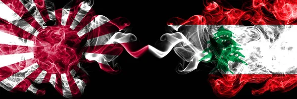 Giappone Sol Levante naval vs Libano, bandiere mistiche fumose libanesi affiancate. Bandiere astratte di fumo di viaggio di seta colorate spesse — Foto Stock