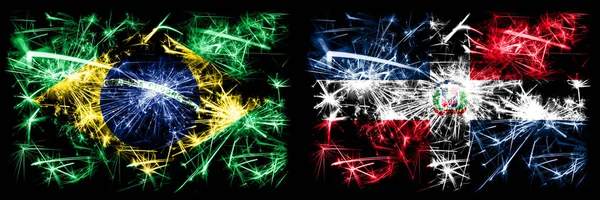 Бразилия, Бразилия против Доминиканской Республики Новый год праздник сверкающие фейерверки флаги концепция фона. Сочетание флагов двух штатов — стоковое фото