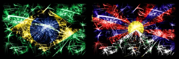 Brazil, Brazilian vs Tibet, Tibetan New Year celebration sparkling fireworks flags concept background. Combination of two states flags