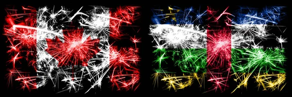 Canada, Canadian vs Central African Republic New Year celebration sparkling fireworks flags concept background. Combination of two abstract states flags — Stock Photo, Image