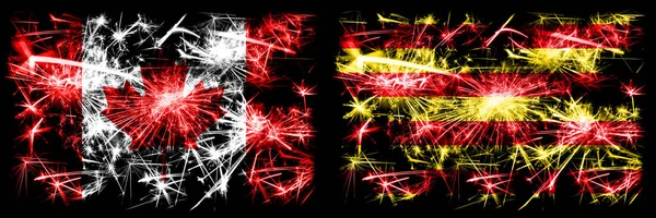 Canadá, Canadá vs Espanha, Catalunha, Catalão, Senyera celebração de Ano Novo fogos de artifício cintilantes fundo conceito bandeiras. Combinação de duas bandeiras de estados abstratos — Fotografia de Stock