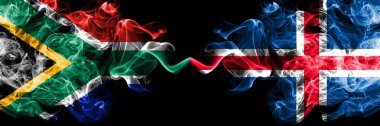 Güney Afrika İzlanda 'ya karşı, İzlanda dumanlı mistik bayrakları yan yana yerleştirildi. Kalın renkli ipeksi soyut duman bayrakları konsepti