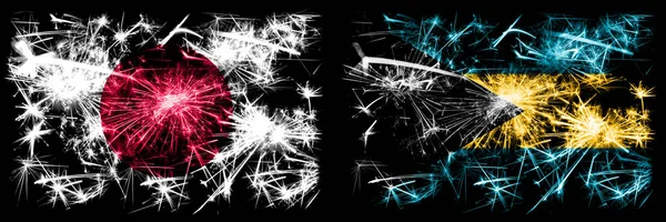 Japan, Japanese vs Bahamas, Bahamian New Year celebration sparkling fireworks flags concept background. Combination of two abstract states flags