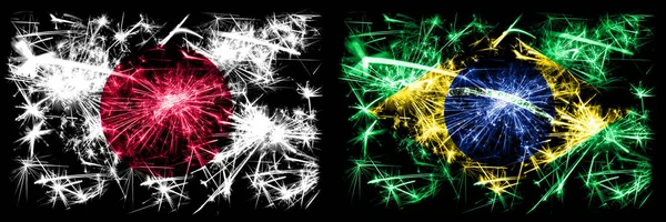 Japan, Japanese vs Brazil, Brazilian New Year celebration sparkling fireworks flags concept background. Combination of two abstract states flags — Stock Photo, Image