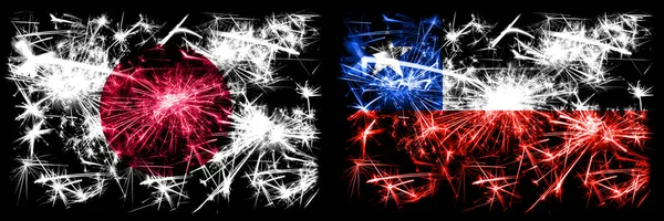 Japan, Japan vs Chili, Chileense nieuwjaarsviering sprankelend vuurwerk vlaggen concept achtergrond. Combinatie van twee abstracte vlaggen — Stockfoto