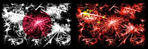 Japan, Japan vs China, chinesische Neujahrsfeier funkelnden Feuerwerk Flaggen Konzept Hintergrund. Kombination aus zwei abstrakten Staaten Flaggen — Stockfoto
