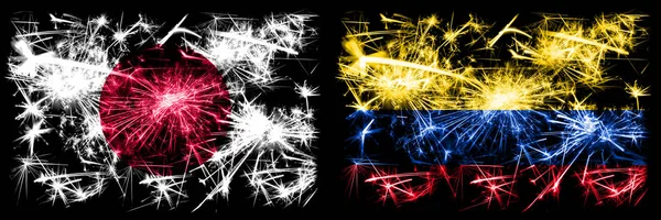 Japan, Japan vs Kolumbien, kolumbianische Neujahrsfeier funkelnden Feuerwerk Flaggen Konzept Hintergrund. Kombination aus zwei abstrakten Staaten Flaggen — Stockfoto