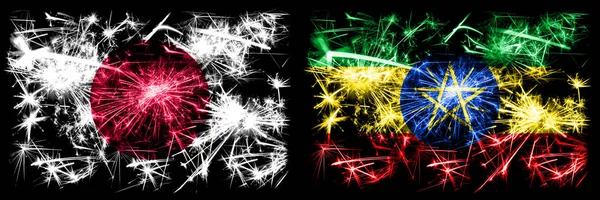 일본, 일본 vs 에티오피아, 에티오피아 신년 축하 불꽃 깃발 컨셉 배경. 두 개의 추상 국가가 결합 된 깃발 — 스톡 사진