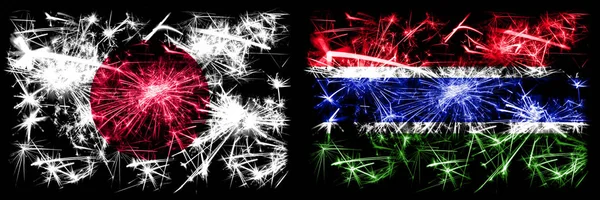 Japonsko, Japonsko vs Gambie, Gambian novoroční oslavy jiskřivé ohňostroje vlajky koncept pozadí. Kombinace dvou abstraktních stavových příznaků — Stock fotografie