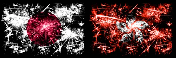 Japan, Japanese vs Hong Kong, China New Year celebration sparkling fireworks flags concept background. Combination of two abstract states flags