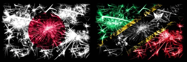 Japan, Japanese vs Saint Kitts and Nevis New Year celebration sparkling fireworks flags concept background. Combination of two abstract states flags — Stock Photo, Image