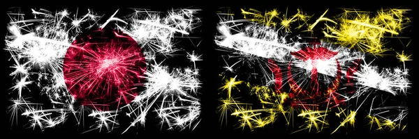 Japan, Japanese vs Brunei, Bruneian New Year celebration sparkling fireworks flags concept background. Combination of two abstract states flags — Stock Photo, Image