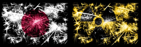 Japan, Japanese vs Nuclear, radioactive, radiation, hazard New Year celebration sparkling fireworks flags concept background. Combination of two abstract states flags — Stock Photo, Image