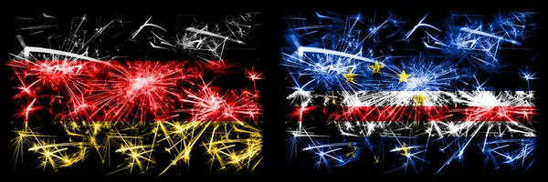 ドイツ、ドイツ対カーボベルデ新年のお祝い旅行輝く花火の旗のコンセプトの背景。2つの抽象的な状態フラグの組み合わせ. — ストック写真