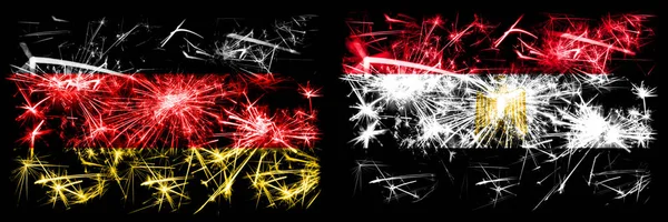 Germany, German vs Egypt, Egyptian New Year celebration travel sparkling fireworks flags concept background. Combination of two abstract states flags. — Stock Photo, Image