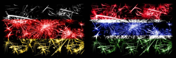 Deutschland, Deutschland vs Gambia, gambische Neujahrsfeier reisen funkelnde Feuerwerk Flaggen Konzept Hintergrund. Kombination aus zwei abstrakten Staaten Flaggen. — Stockfoto