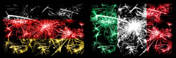 Deutschland, Deutsch gegen Italien, Italienische Neujahrsfeier Reise funkelnden Feuerwerk Flaggen Konzept Hintergrund. Kombination aus zwei abstrakten Staaten Flaggen. — Stockfoto