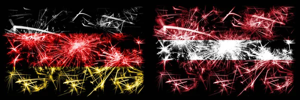 Deutschland, Deutsch gegen Lettland, Lettland Neujahrsfeier Reise funkelnden Feuerwerk Flaggen Konzept Hintergrund. Kombination aus zwei abstrakten Staaten Flaggen. — Stockfoto