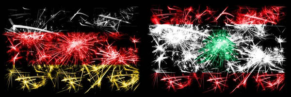독일, 독일 vs 레바논, 레바논 새해 축하 행사가 불꽃 깃발 컨셉트 배경으로 진행 된다. 두 개의 추상 국가가 결합 된 깃발. — 스톡 사진